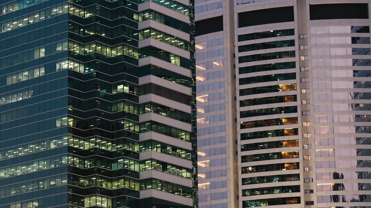 Time Lapse of business center building from day to night