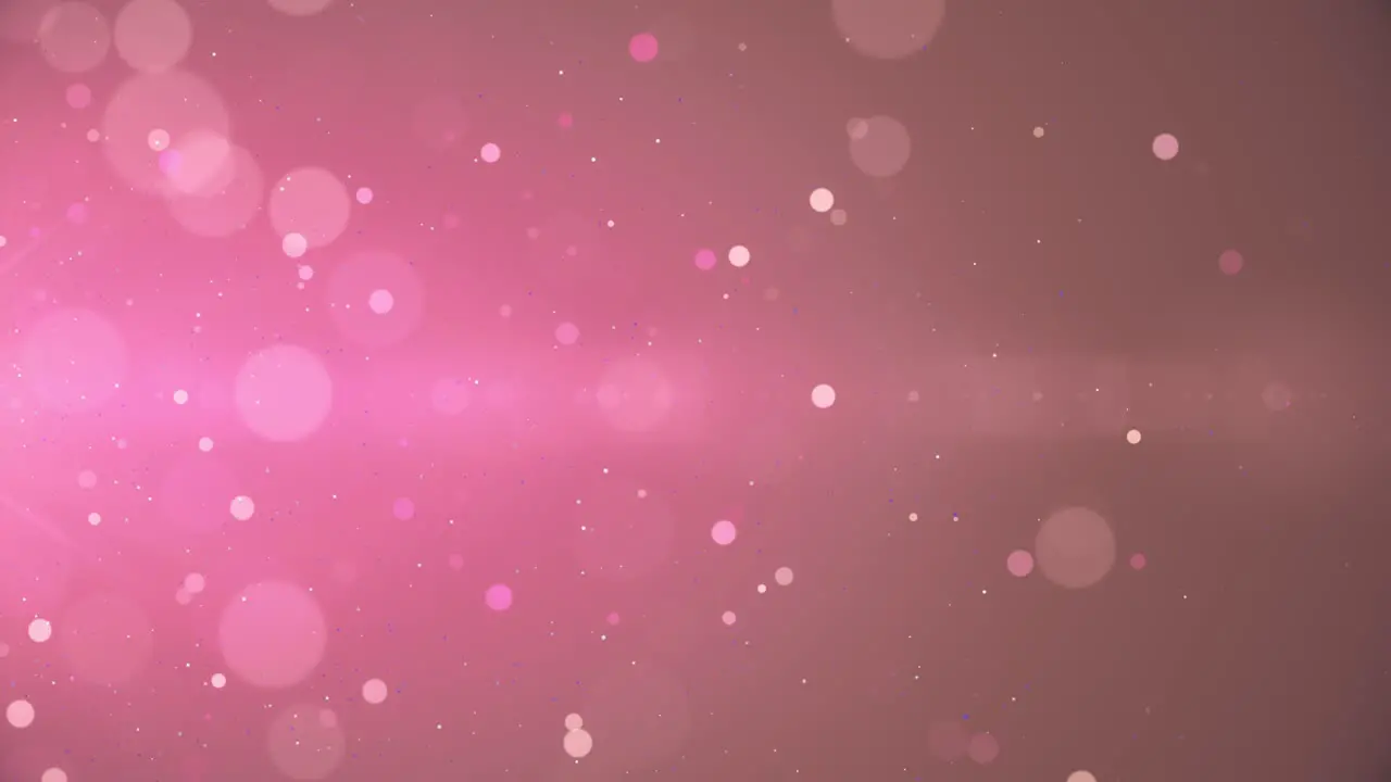 Pink blurry bokeh background with lights particles