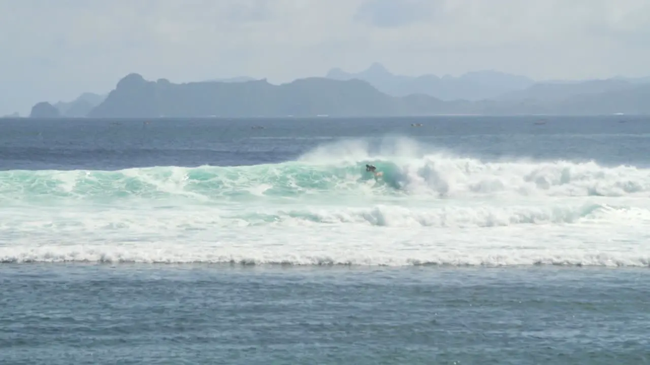 Surfer Carving a Wave