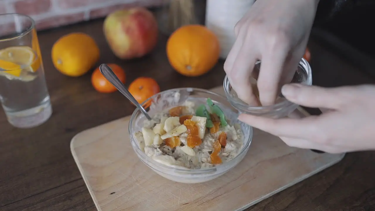 Preparing Oatmeal Porridge With Fruit