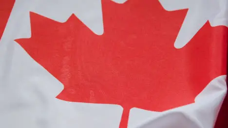 Close Up Studio Shot Of Canadian Flag Filling Frame