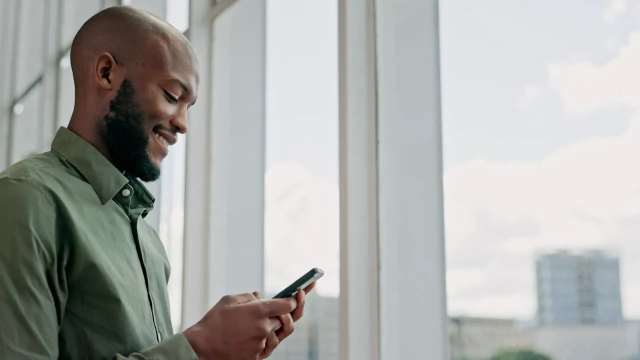 Typing smartphone and business black man