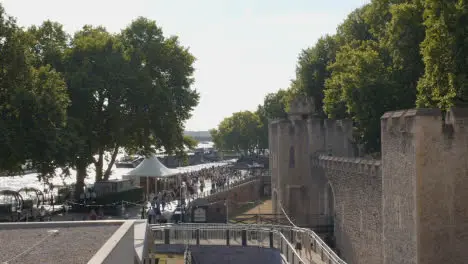 Crowd Of Summer Tourists Walking By The Tower Of London England UK 4