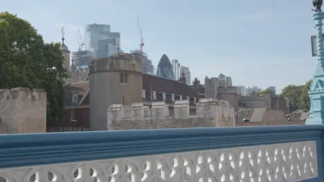 From Tower Bridge To Exterior Of The Tower Of London With Modern City Skyline Behind England UK