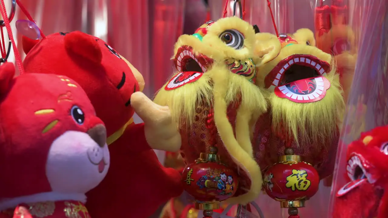 Chinese New Year decorative ornaments such as yellow lions seen for sale at a shop ahead of the Lunar Chinese New Year in Hong Kong