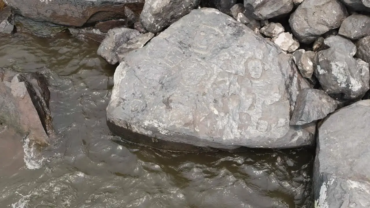 Ponta das Lajes archeological site in Manaus from detail of the millennia-old carvings to open wide aerial shot only seen after severe drought in the Amazon