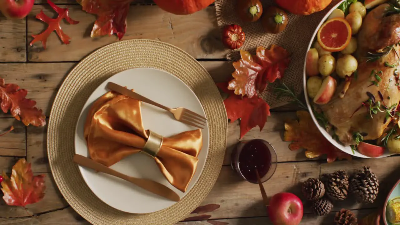 Video of tray with turkey potatoes pumpkins and decorated table prepared for thanksgiving