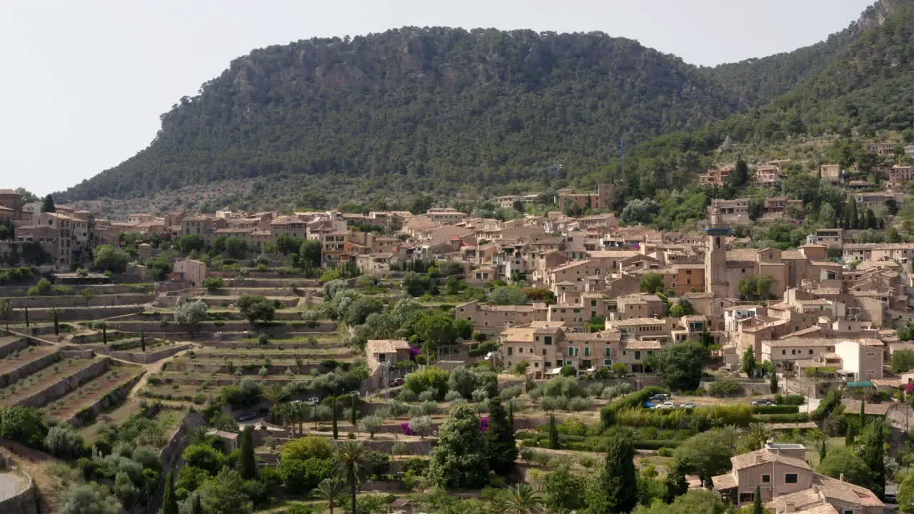 Valldemossa historical village below mountains in Mallorca countryside