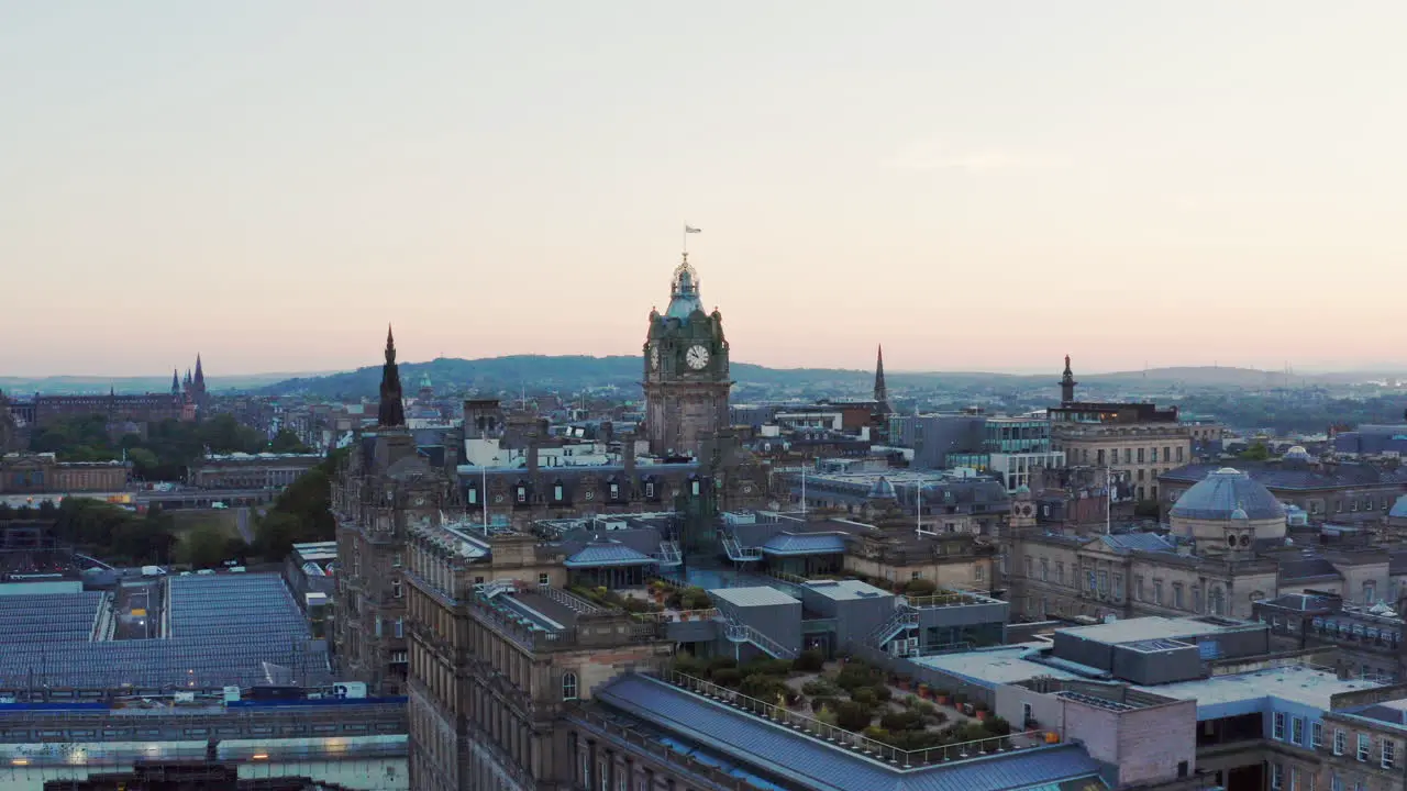 Aerial shot rising over Edinburgh at dusk