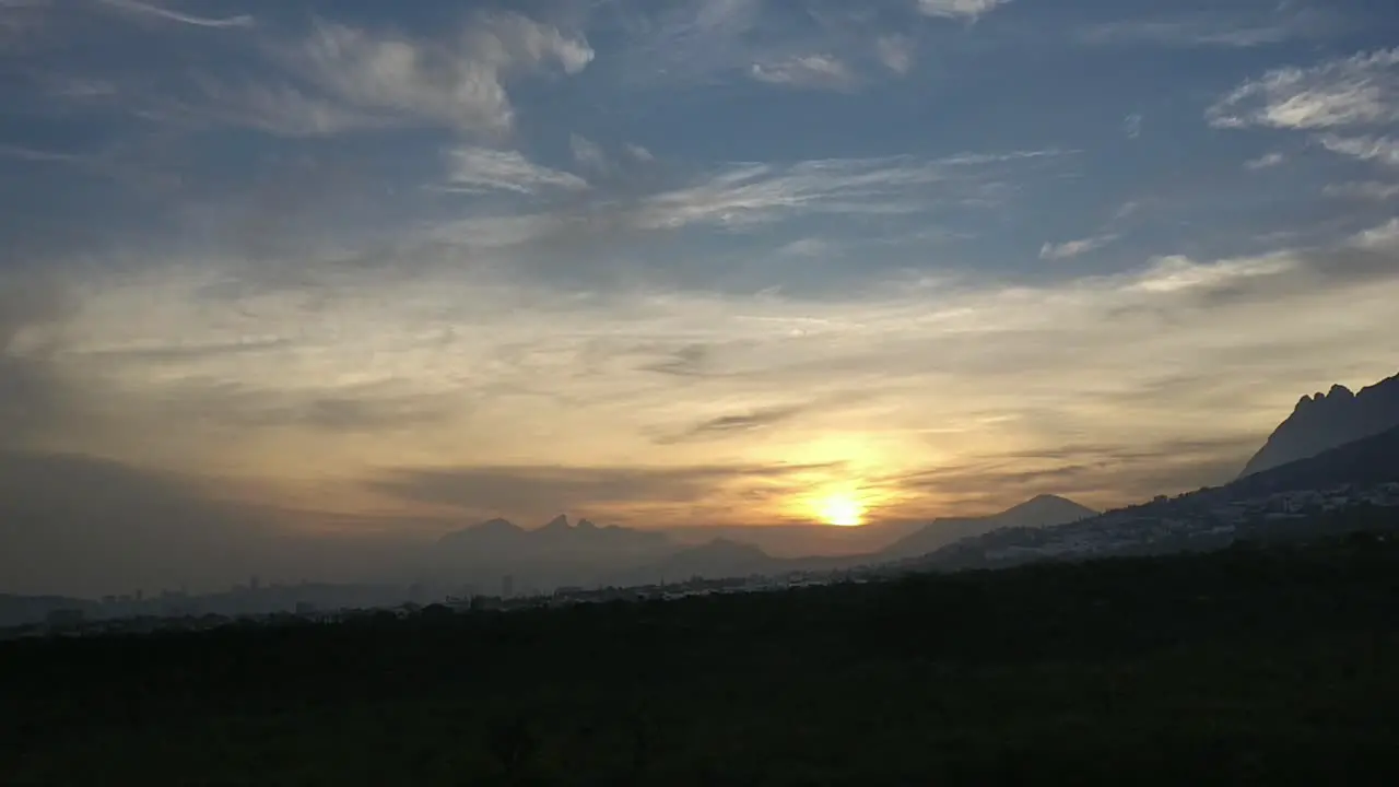 Experience the enchanting sunrise over Cerro de La Silla in this mesmerizing timelapse