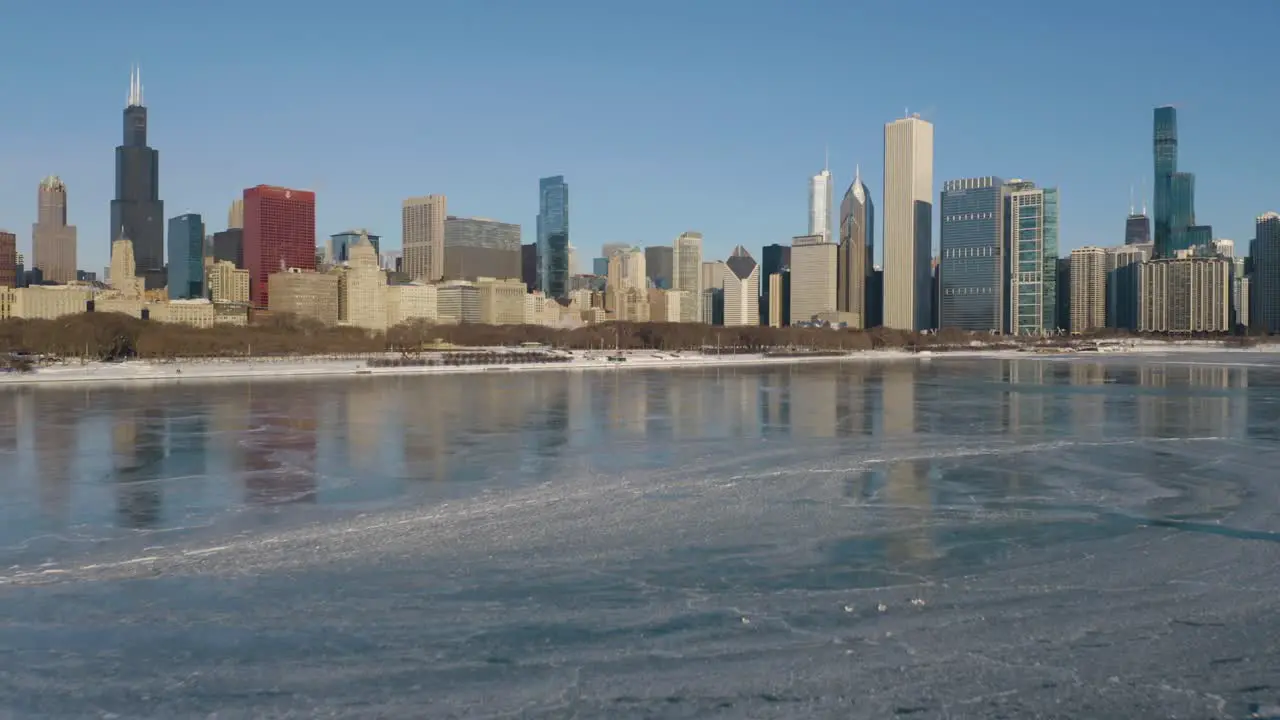 Low Aerial View of Chicago Skyline from Lake Michigan on Freezing Cold Day in Winter