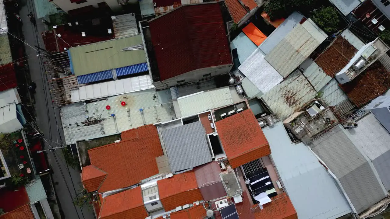 Spinning aerial shot of tightly packed buildings in Hoi An Vietnam