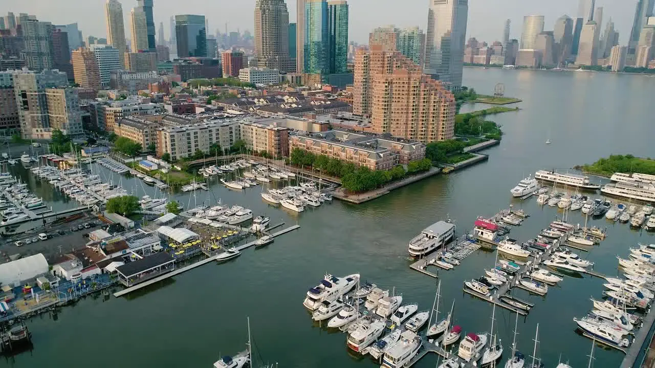 Aerial Orbit of Marina in Jersey City Revealing Manhattan Skyline at Dusk