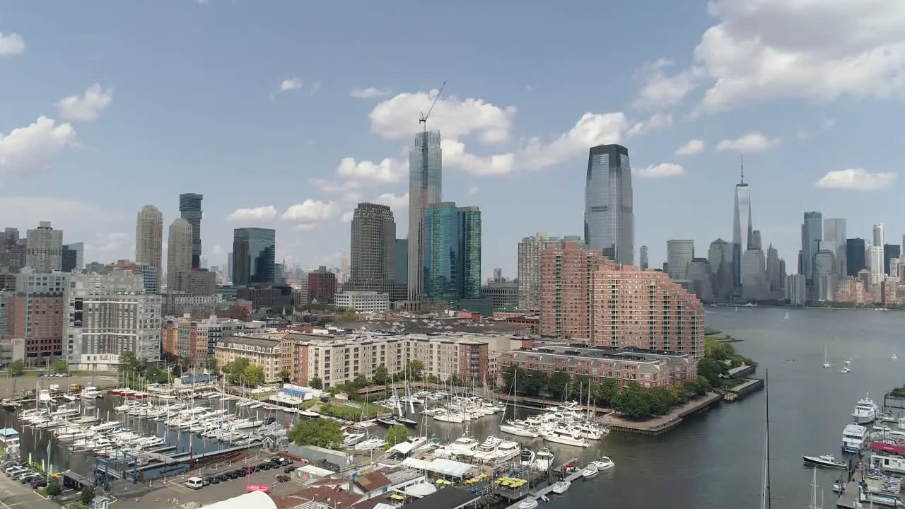 Aerial Forward Dolly Over Marina in Jersey City with Manhattan Skyline