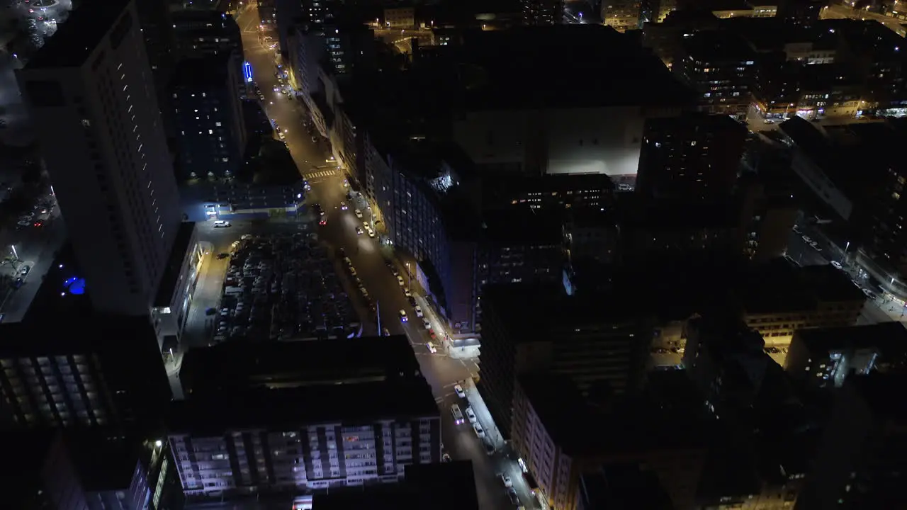 Aerial drone through Durban city centre at night