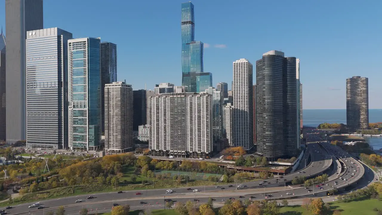 Aerial modern USA city buildings in Chicago elevated highway network and park