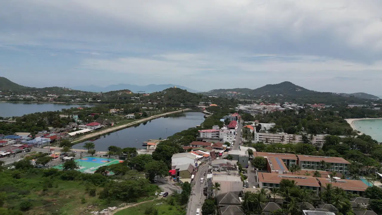 Aerial shot of beach and coastal city 