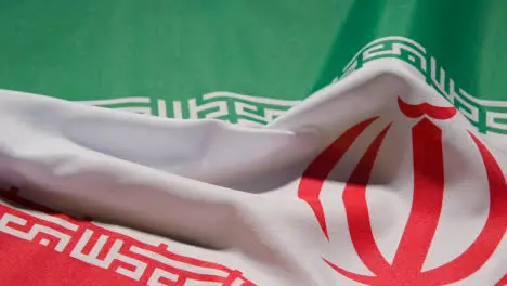 Close Up Studio Shot Of Iranian Flag Filling Frame