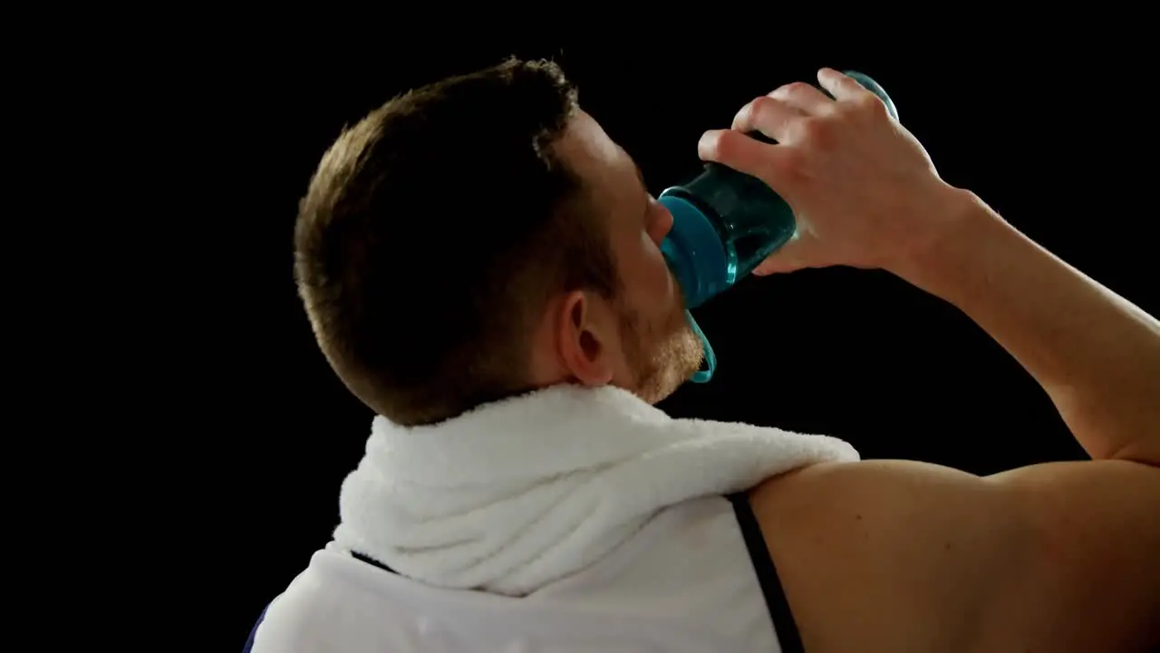 Senior boxer leaning against the punching bag 4k