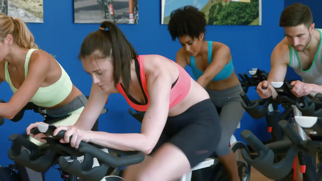 Spin class working out in the gym