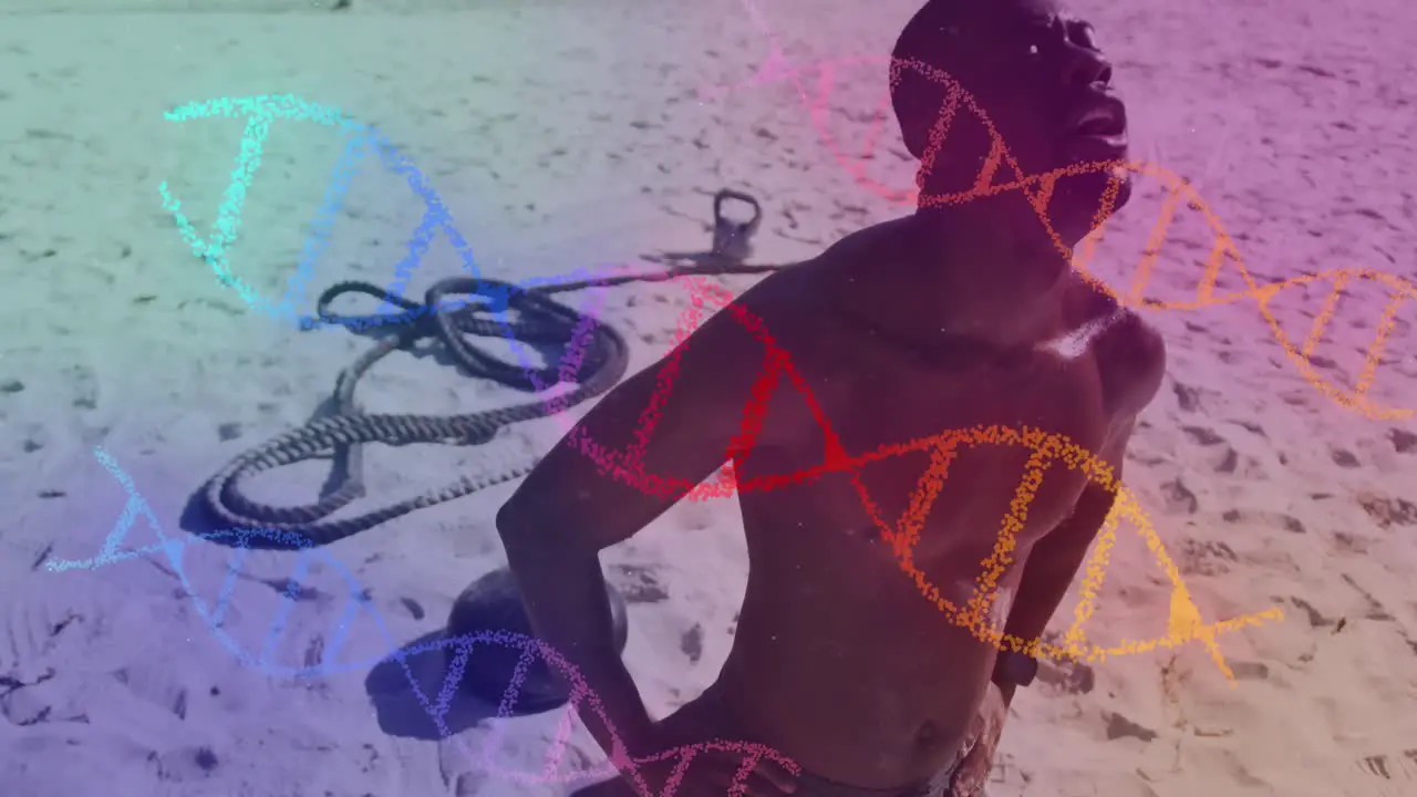 Multiple colorful dna structures against tired african american fit man taking a break at the beach