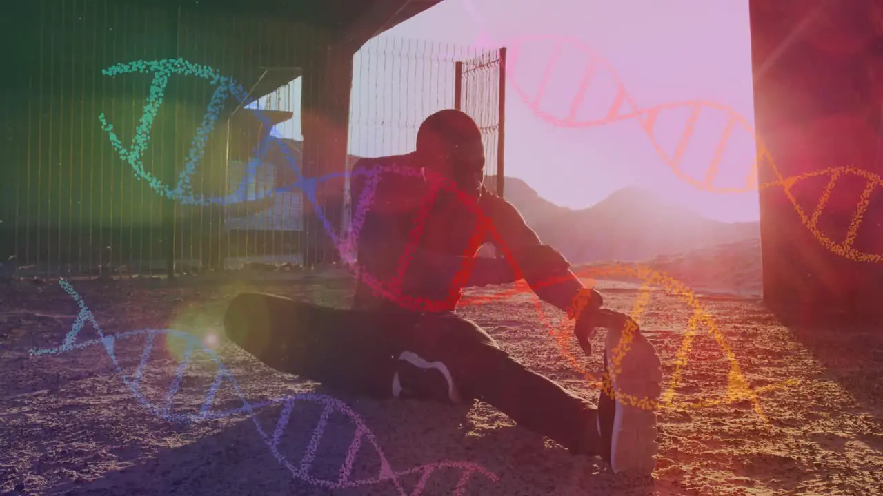 Multiple dna structures against african american fit man performing stretching exercise outdoors