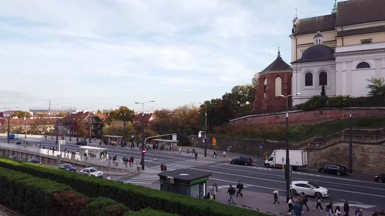 The Road DW629 in downtown of Warsaw city Poland in static shot with crowds of people and heavy traffic