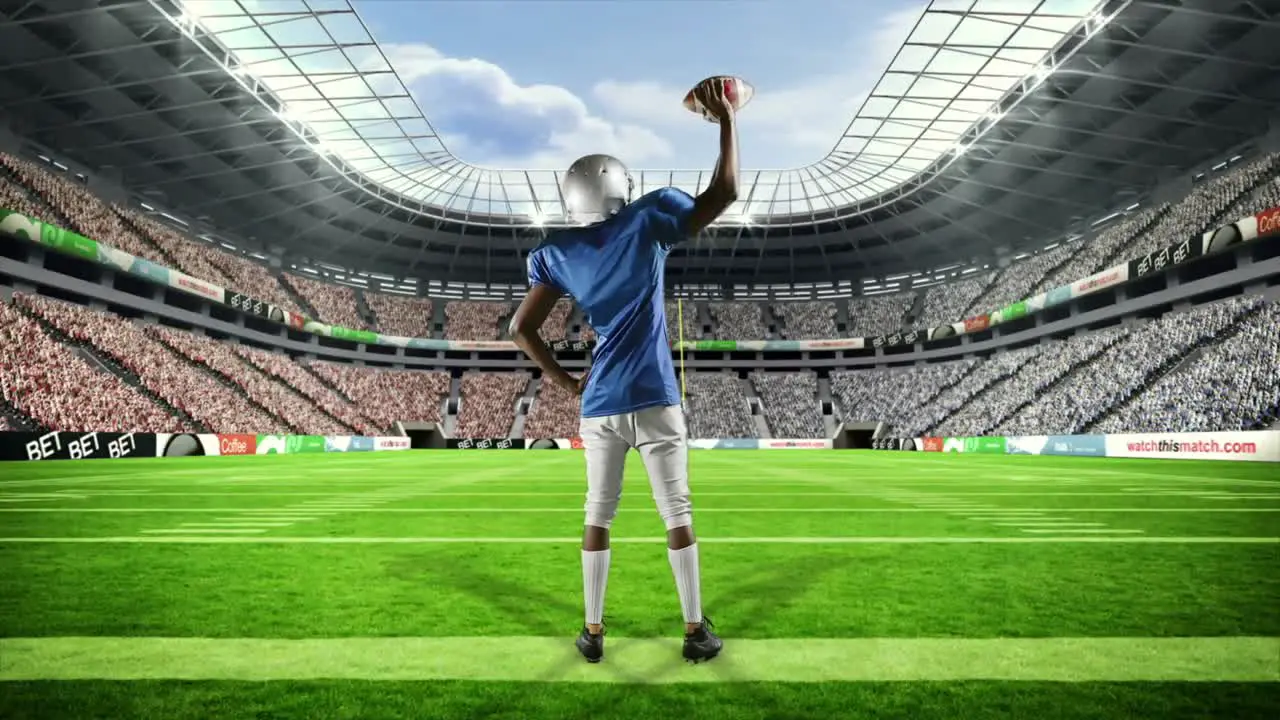 American football player triumphing with raised arms 