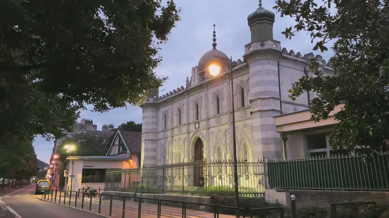 Besançon France street at night with Jewish place of worship architectural beauty the Synagogue