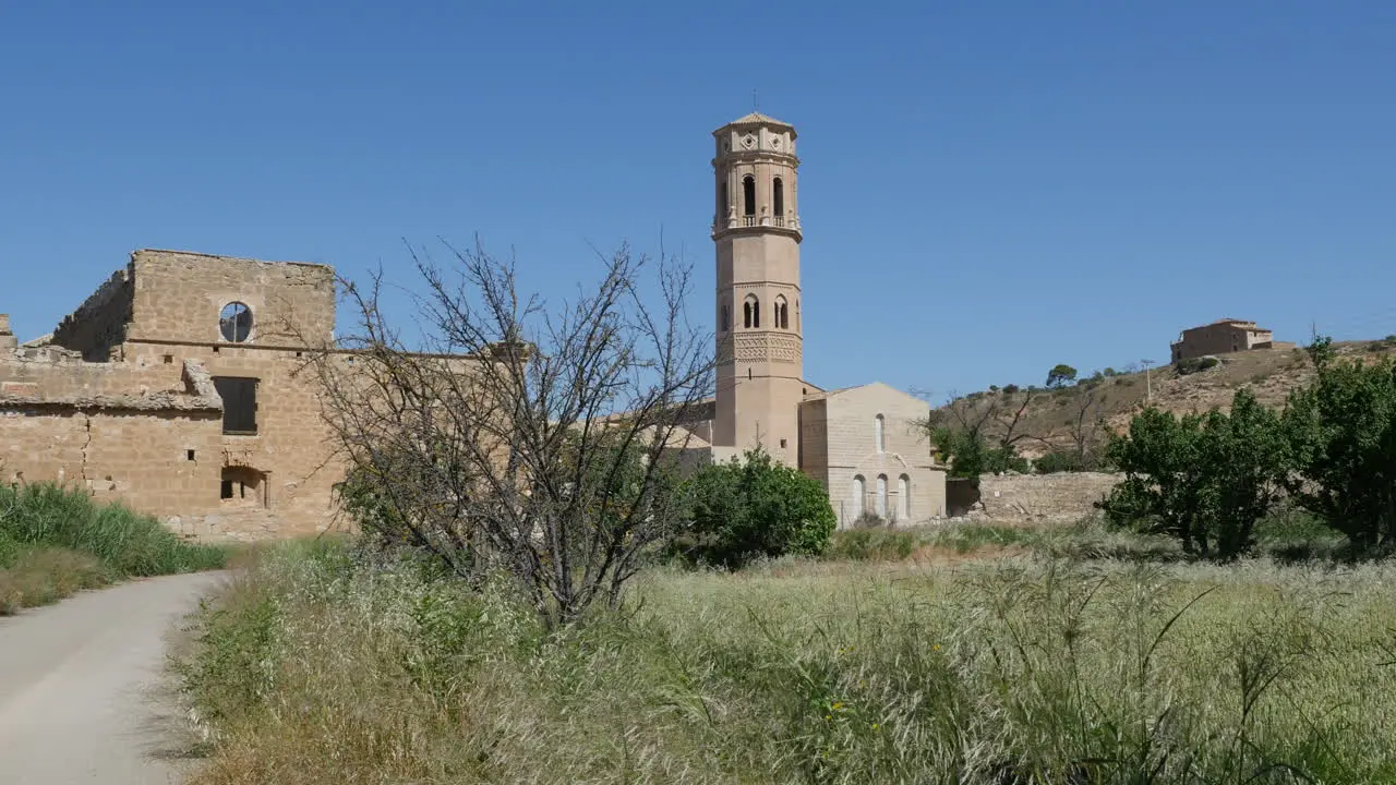 Spain Monasterio De Rueda Shrub With Tower