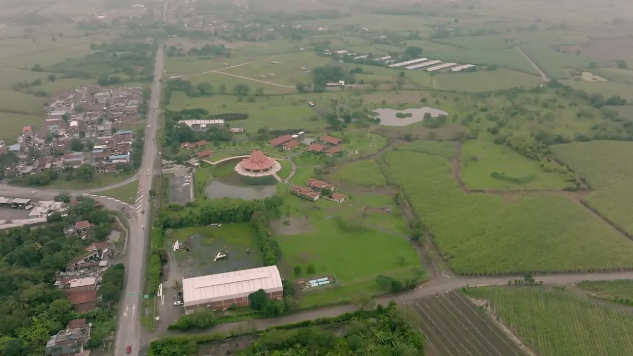 Wide rotating aerial footage showing the property of the Baha’i House of Worship in Cali Colombia