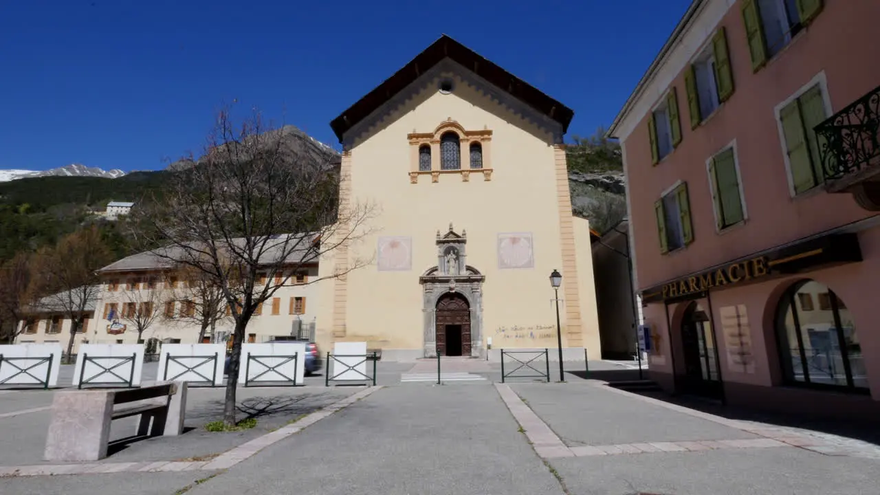 France Church In Jausiers With Traffic