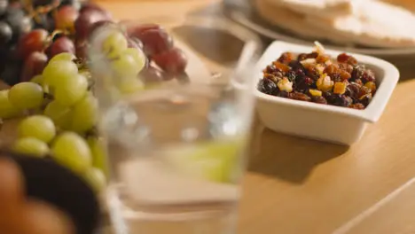 Close Up Of Food On Muslim Family Table In Home Set For Meal Celebrating Eid 2