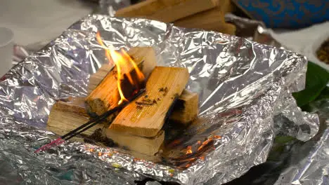 Close Up Of Fire Being Lit At Beginning Of Havan Hindu Ceremony