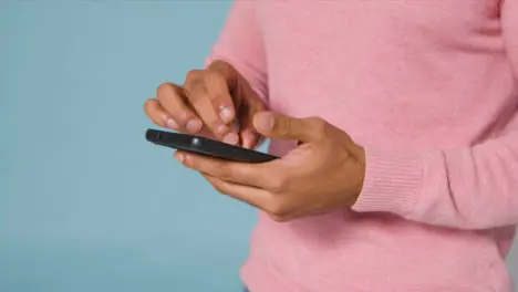 Close Up Shot of a Man Texting and Answering Phone Call