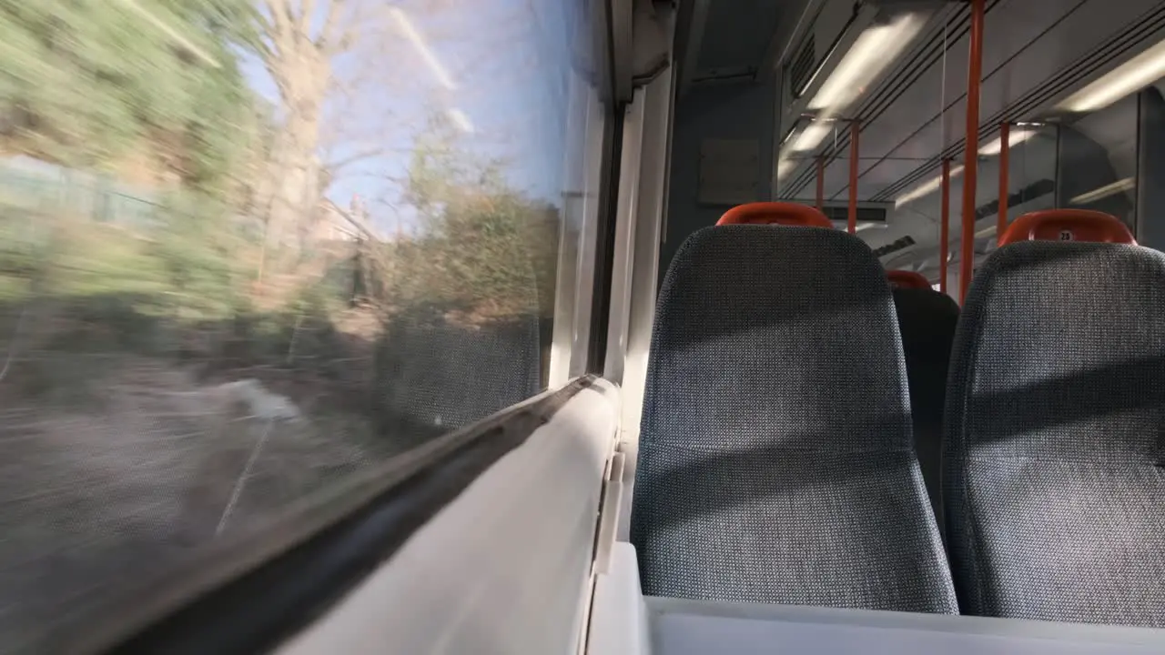 Looking out the window empty seat UK national rail train sunny day