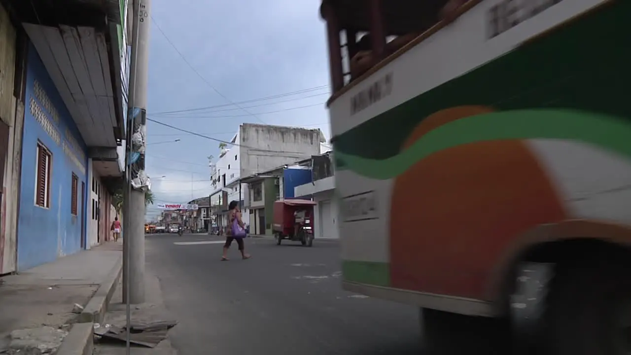 Local Bus Dropping Off And Picking Up Passengers On Road In Iquitos Peru