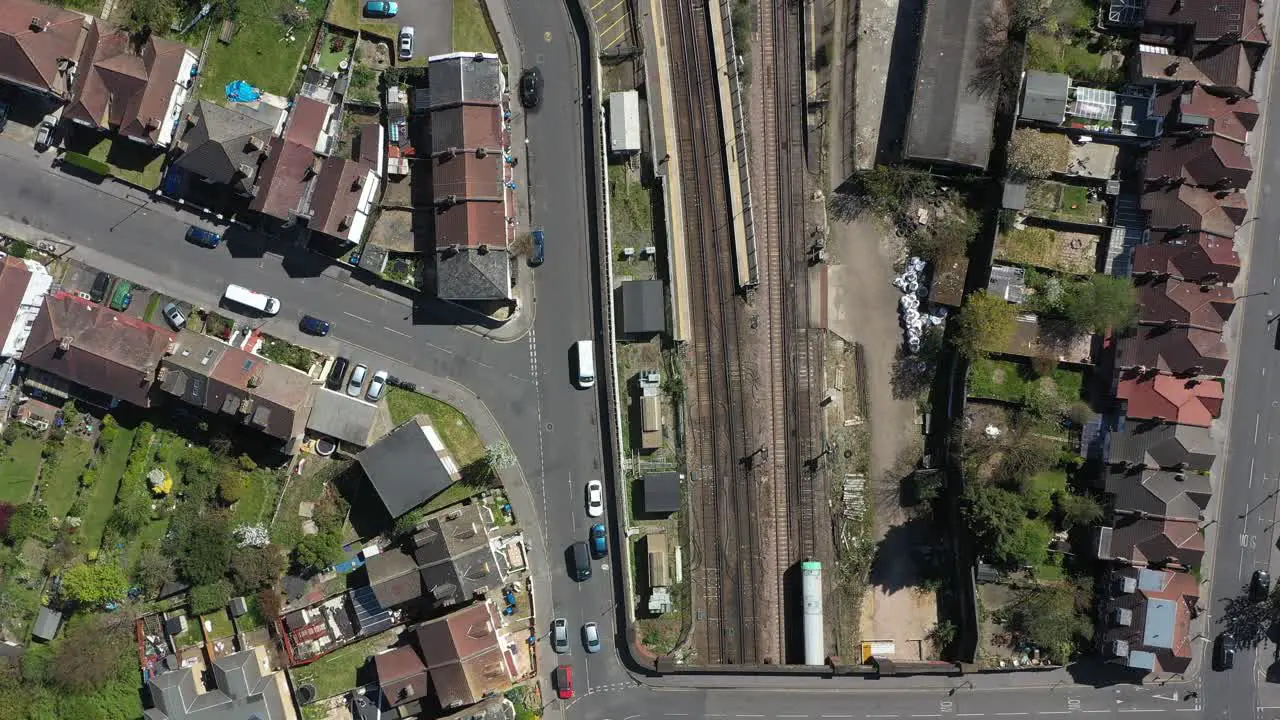 National rail train passing through gentrified suburban london drone shot