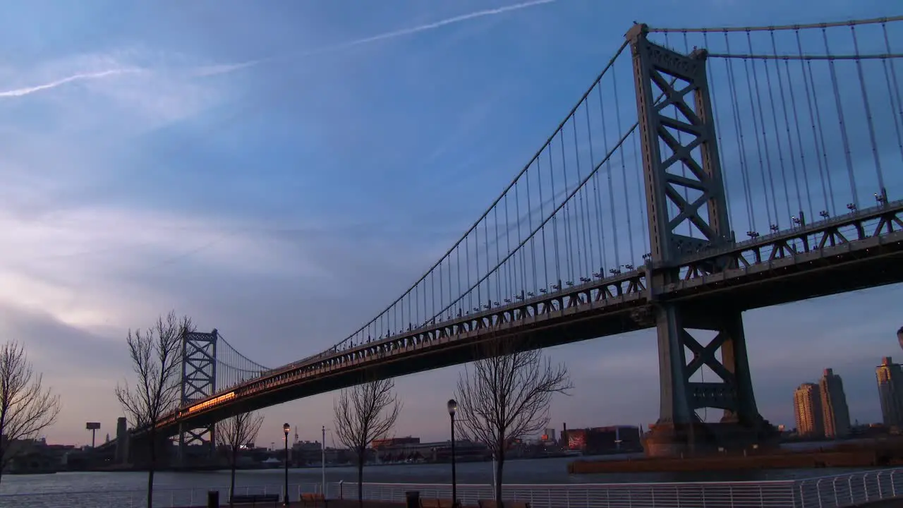 A commuter train crosses the Ben Franklin Bridge near Philadelphia PA