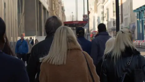 Pedestrians Walking In Busy London Street Daytime