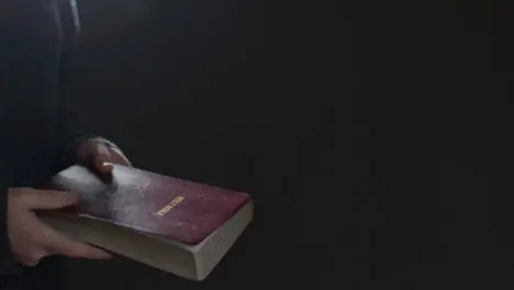 Tracking Shot of Crucifix and a Holy Bible