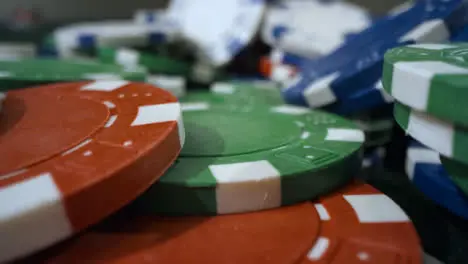 Sliding Extreme Close Up Shot Over Pile of Poker Chips