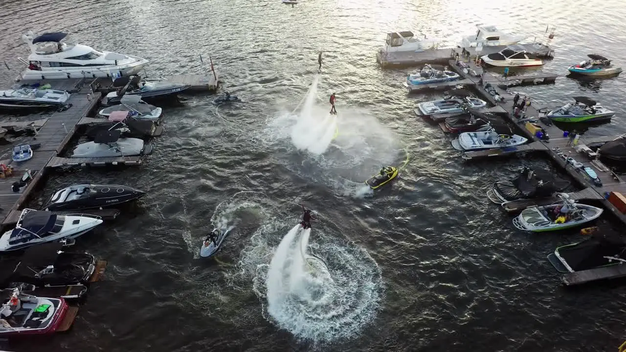 Water jet flyboarder performing