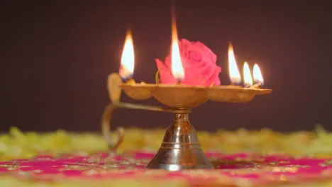 Still Life Of Five Wick Lamp With Decorations Celebrating Festival Of Diwali