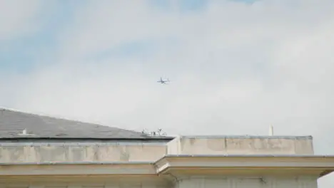 Long Shot of Plane Flying In Sky