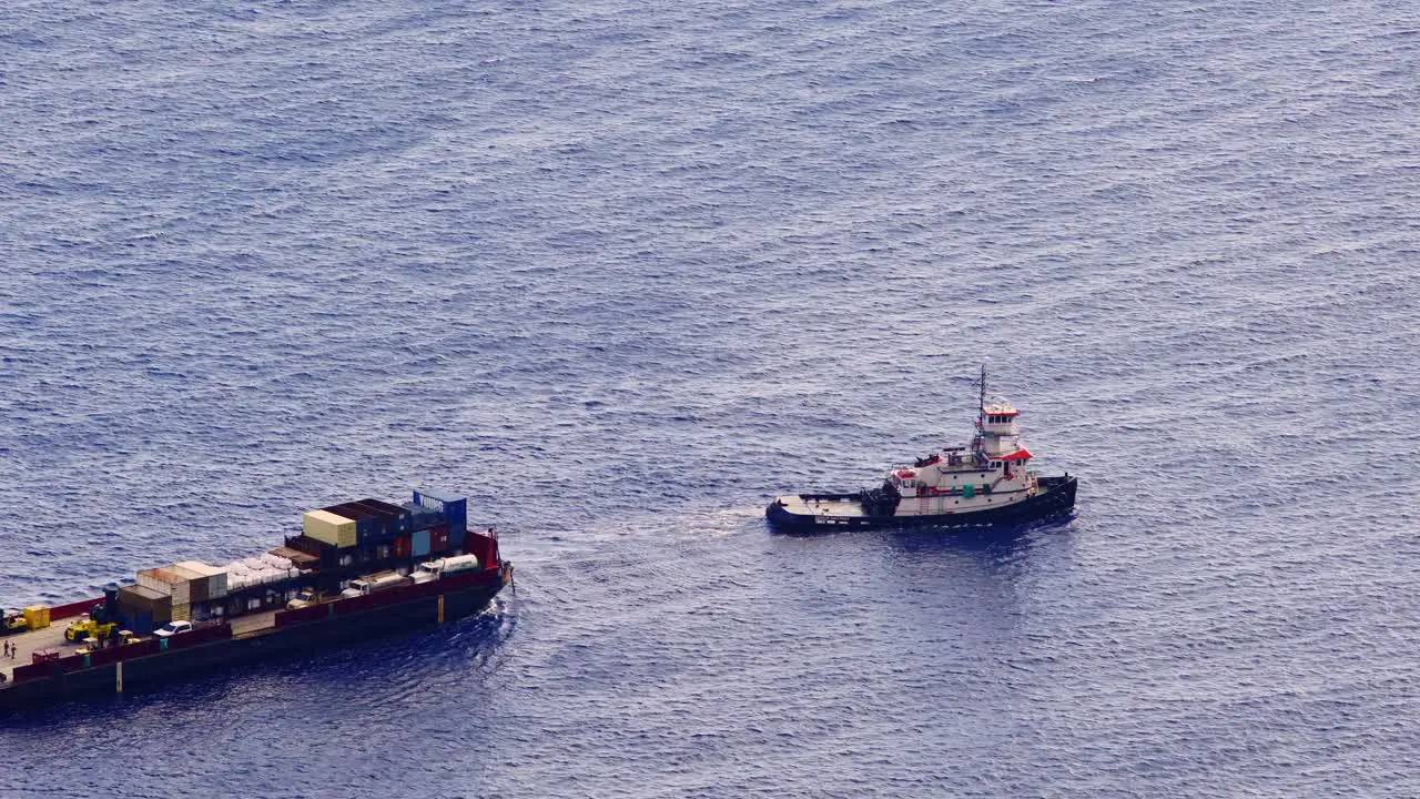 A once a year barge with goods and supplies arrives on the Hawaiian island of Molokai to the port of Kalaupapa Hawaii 1