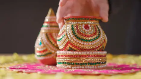 Traditional Coconut Pots On Table Decorated For Celebrating Festival Of Diwali 1