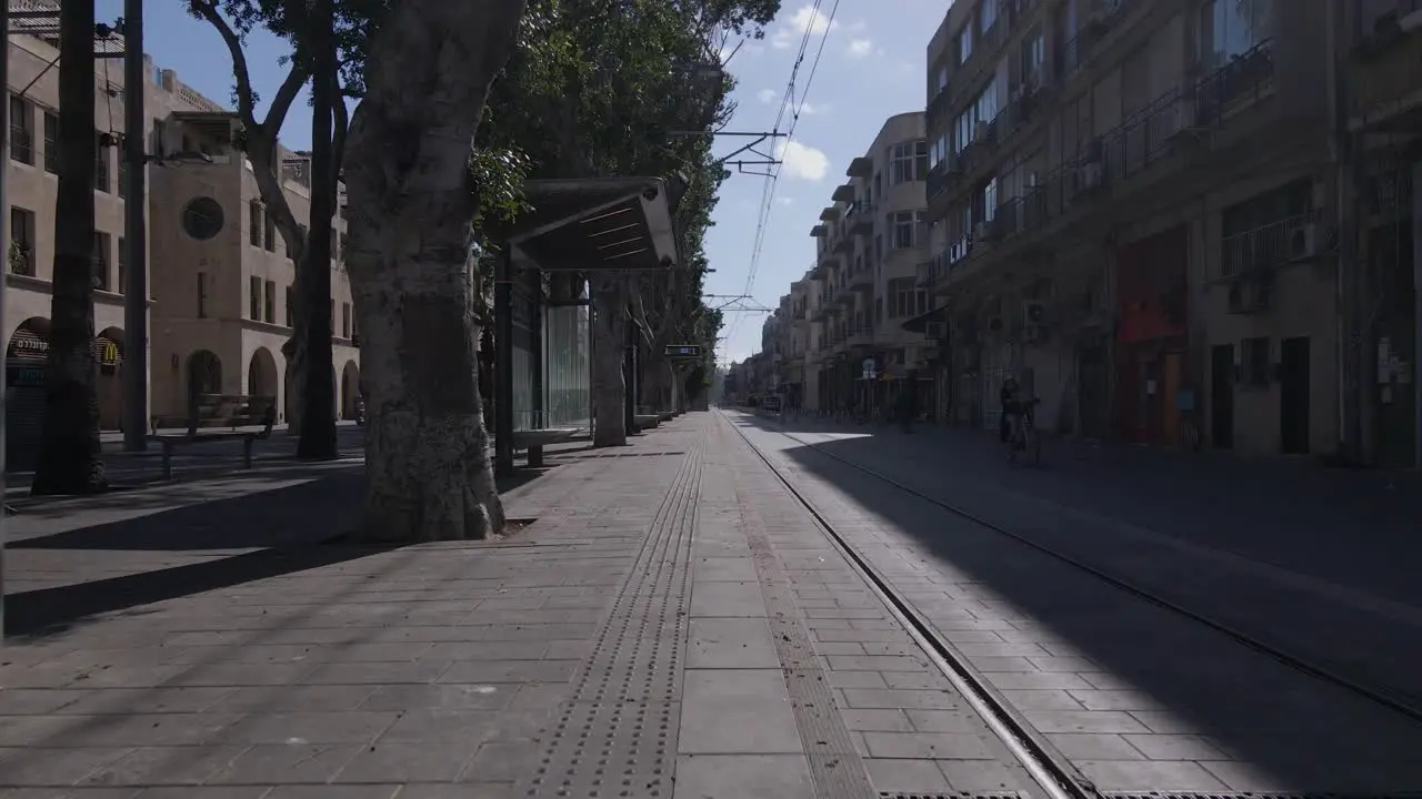 Empty tram station in the city establishing shot