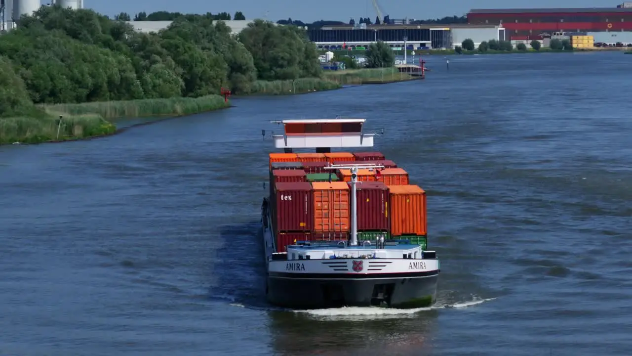 Cargo Vessel on Zwijndrecht River Shores