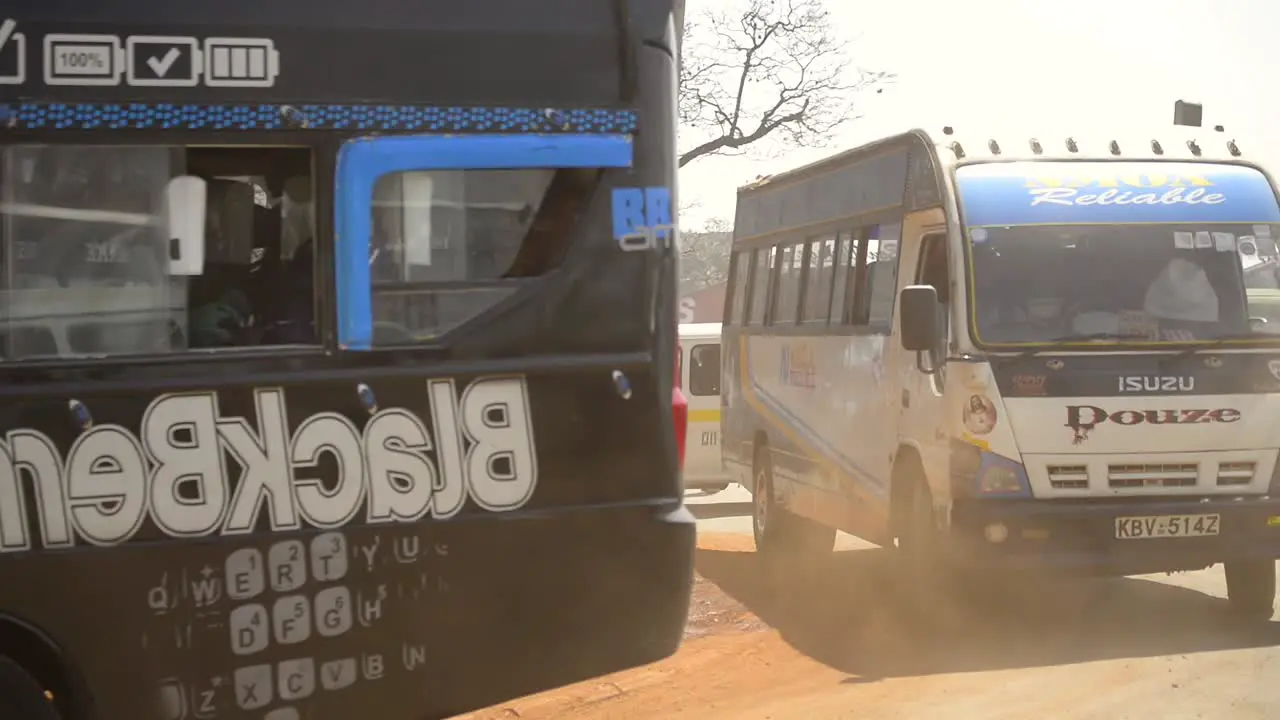 Public buses drive through Nairobi's city center in Kenya East Africa